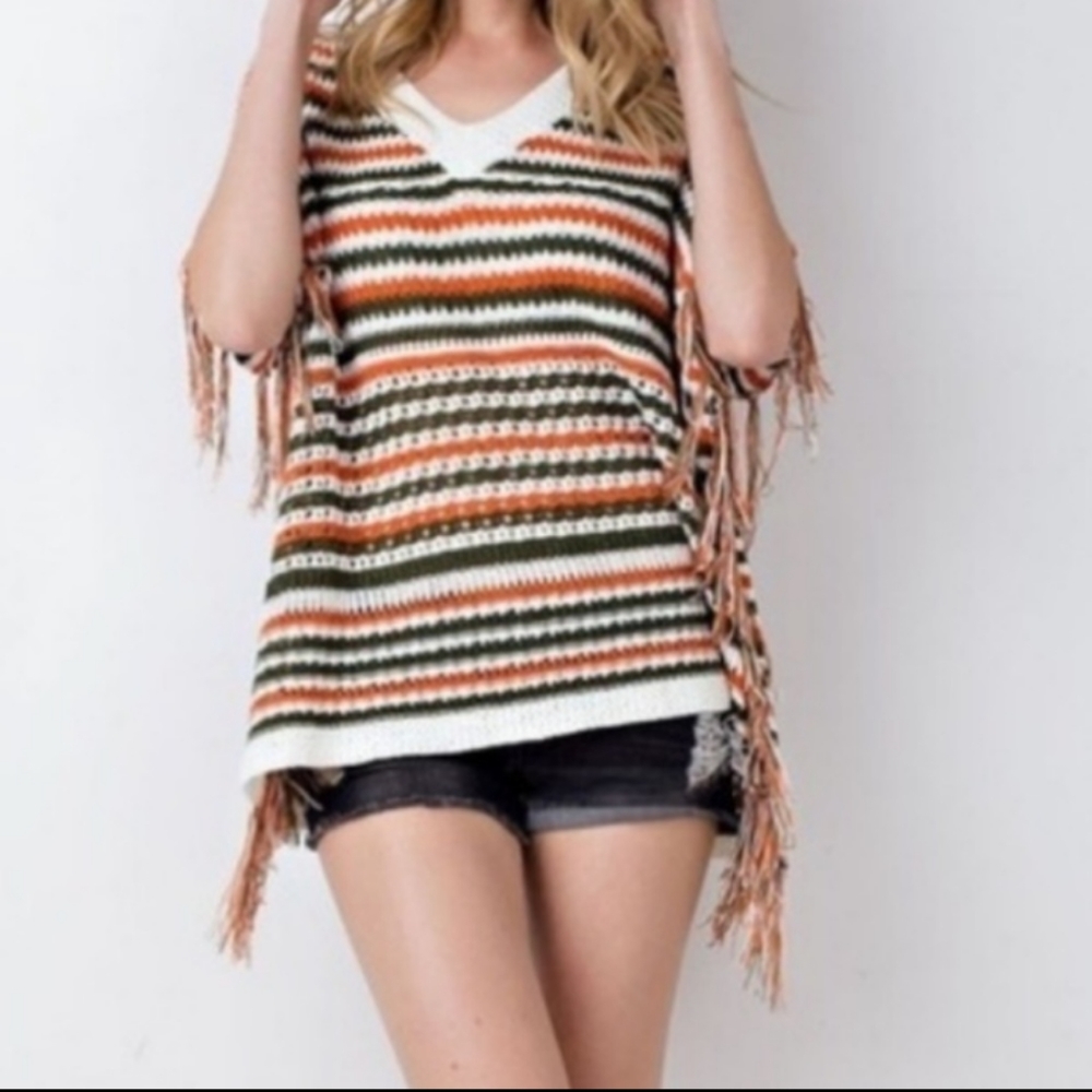 NWT. Oversized striped knit fringed poncho.